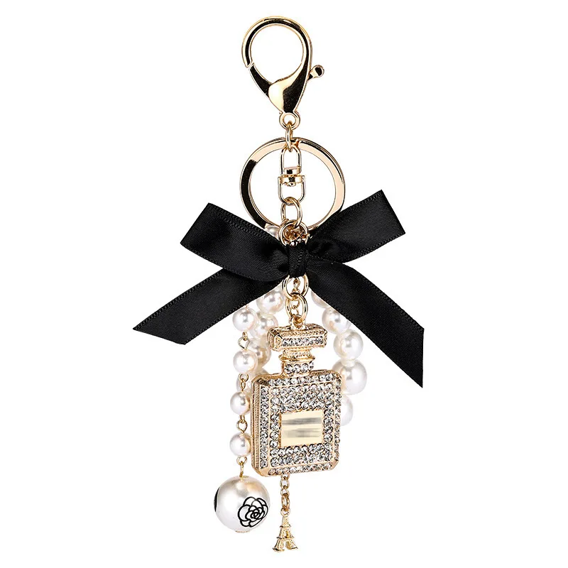 

New Model Small Fragrant Wind Pearl Perfume Bottle Bow Key Chain Fashion Lady Bag Luxury Accessories Car Key Buckle