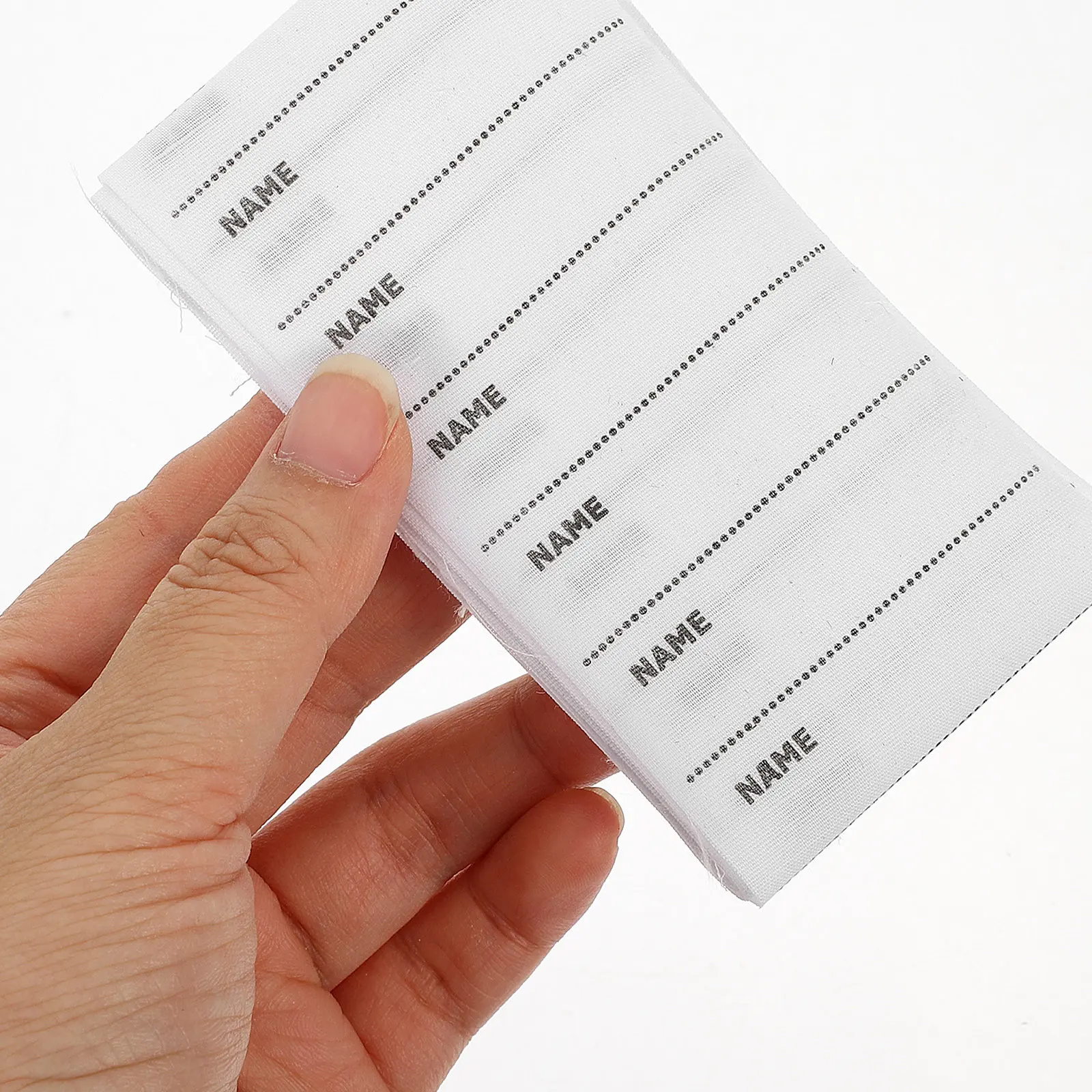 

100Pcs Iron on Name Labels for Clothing DIY Writable Blank Tags Polyester Cotton Material for School Daycare Care Home Garments