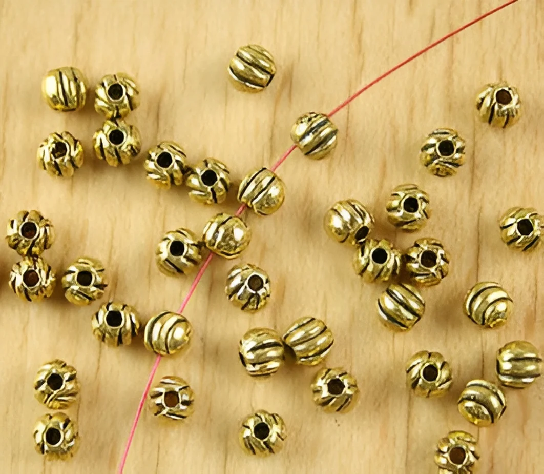 

80pcs 4.7x4.2mm, hole 1.1mm Alloy matel antiqued gold round spacer beads HWH2311