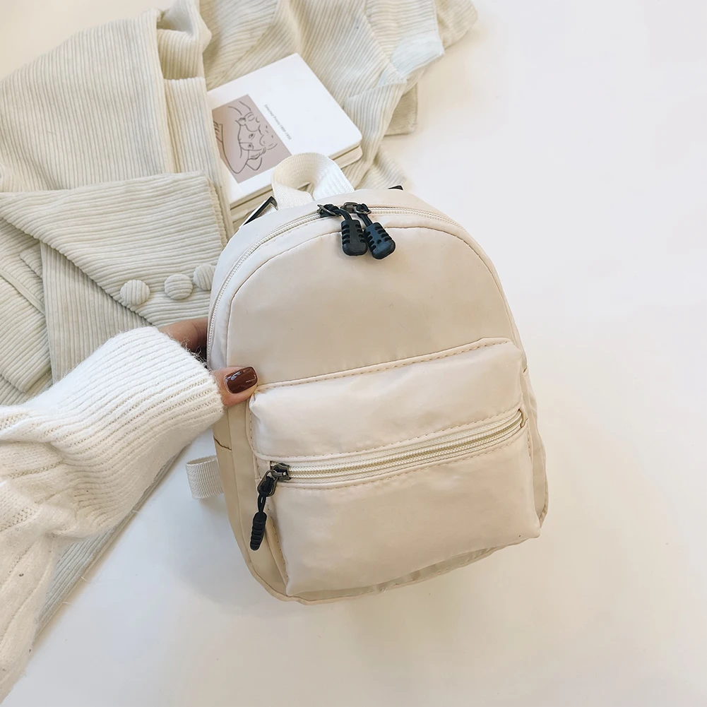 حقيبة ظهر عصرية بلون سادة للنساء من النايلون حقيبة ظهر صغيرة على طراز Preppy