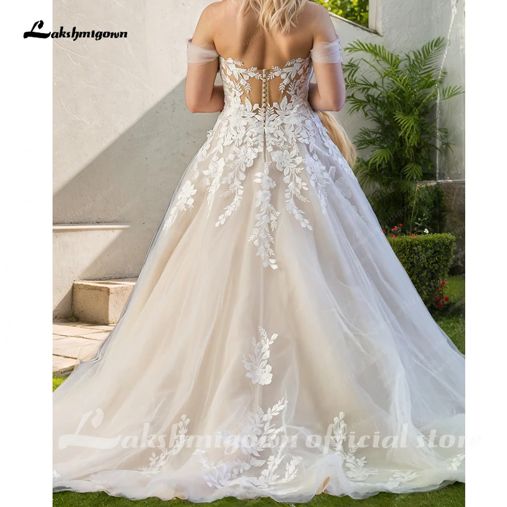 Lakshmigown เซ็กซี่สุภาพสตรีปิดไหล่ลูกไม้ Appliqués ชุดแต่งงานชายหาด Boho ชุดเจ้าสาวแขนกุด Robe 2025 ที่กําหนดเอง