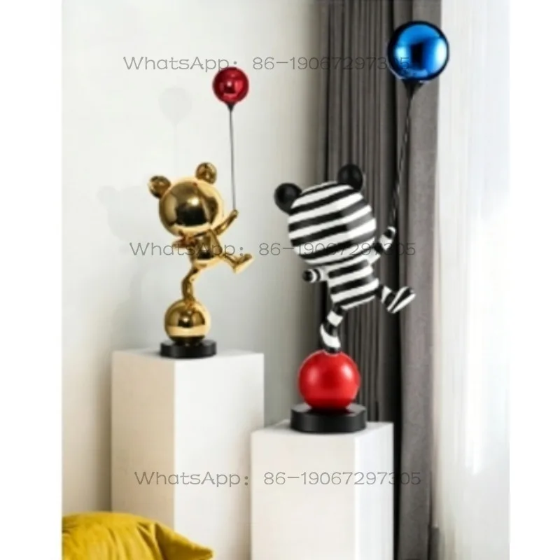 Modern minimalist cartoon acrobatic bear ornament living room TV cabinet next to the entrance