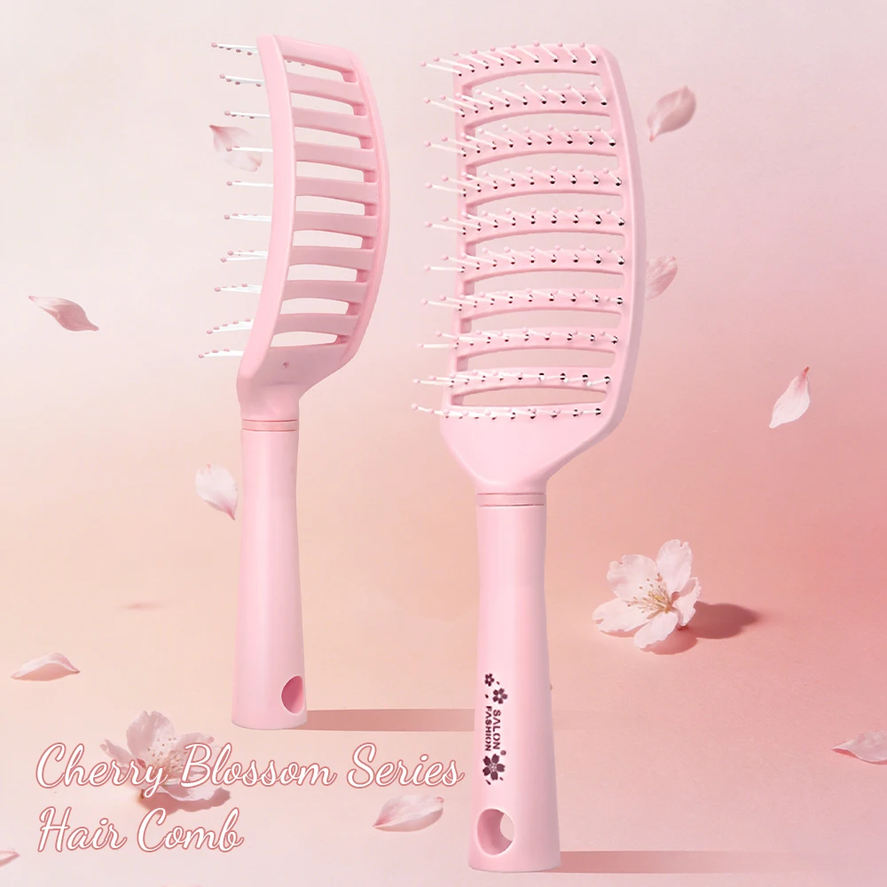 

Розовая расческа-щетка для волос Cherry Blossom Pink - гибкая полая конструкция, щетина с закругленными кончиками для массажа кожи головы и придания объема.