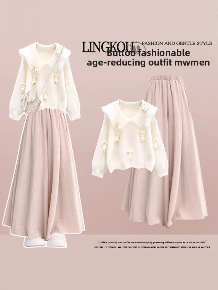 

Комплект Sweet Style Plus Size: осенний женский костюм с топом с воротником «Питер Пэн» и утягивающим эффектом, а также юбка-брюки, скрывающая недостатки фигуры, из двух предметов.