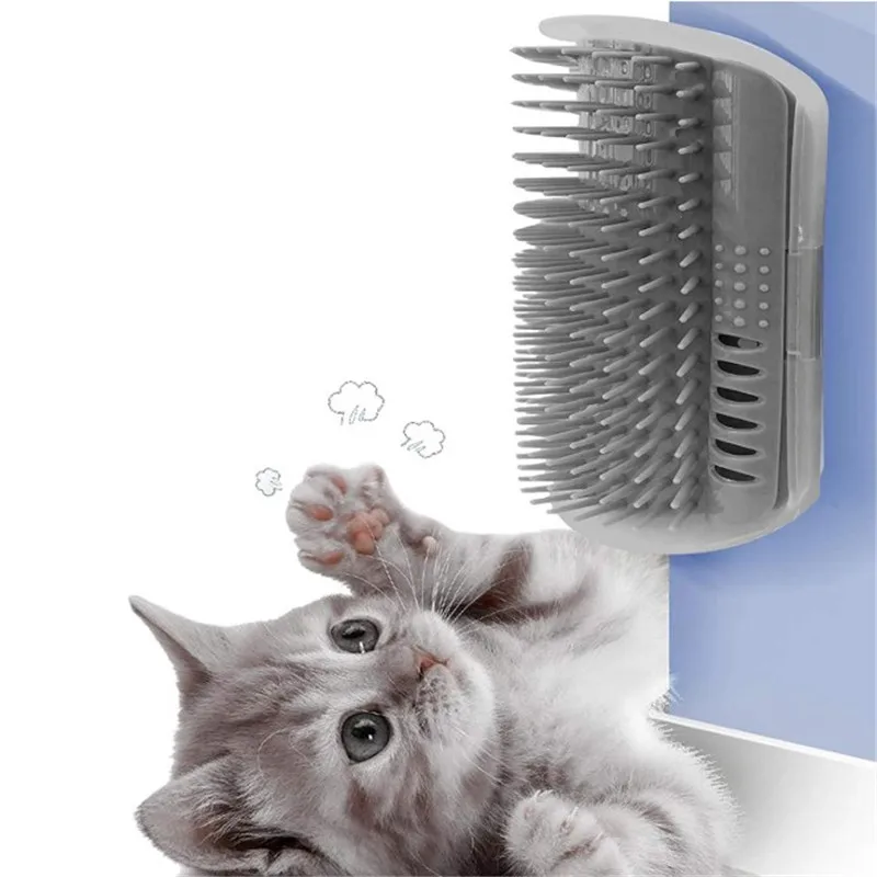 Os gatos esfregam o produto do animal de estimação da cara com catnip escova para a remoção do cabelo do gato
