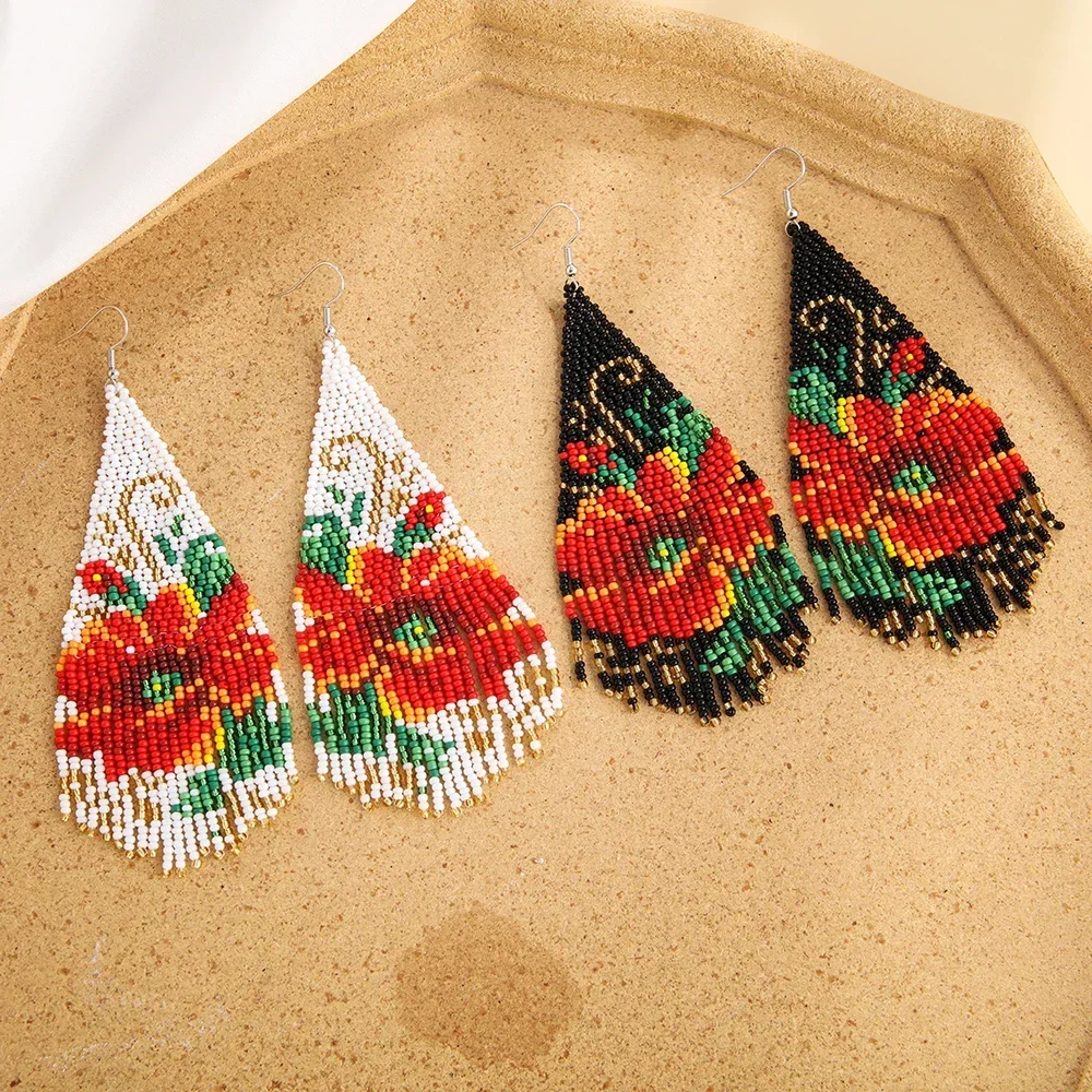 Rice bead earrings The bird Design Hand knitting Tassel Bohemia Alloy Flowers Fashion Originality Simple Beaded earrings