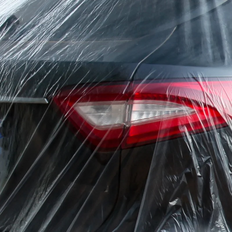 غطاء سيارة عالمي يمكن التخلص منه مقاس M/L/XL غطاء خارجي مقاوم للماء مع غطاء غبار مرن