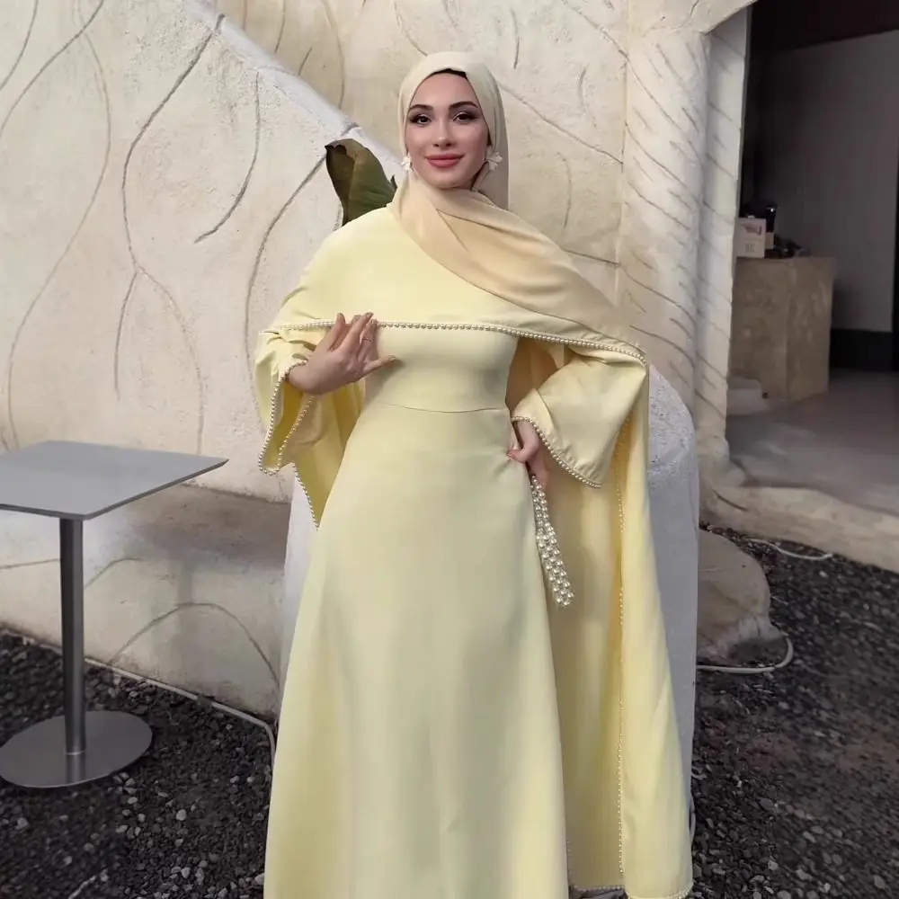 عبايات بتصميم روب طويل، فساتين كافتان مفتوحة من الأمام بتطريز لؤلؤي، فساتين حفلات بتصميم كاب مطوي وأكمام طويلة مطرزة بالخرز، روب طويل 17