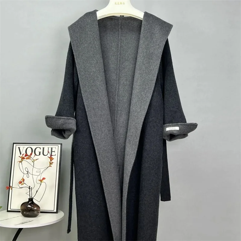 เสื้อโค้ทกันลมผ้าวูลลำลองสำหรับผู้หญิง รุ่นใหม่ ฤดูใบไม้ร่วง ฤดูหนาว ปี 2025 สไตล์เกาหลี ทรงหลวม ความยาวปานกลาง ผ้าวูลสองด้าน