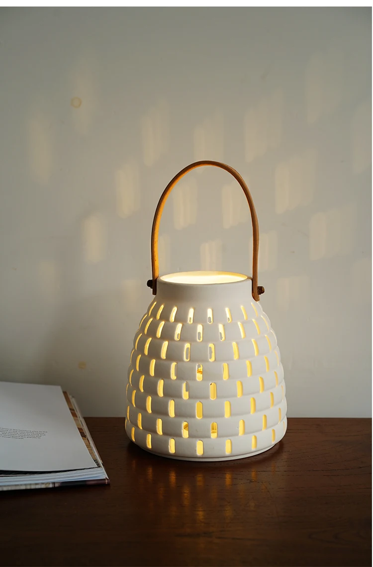 Nordic romance, export European minimalist designer ceramic hollow portable lighting decoration, home party wind lamp