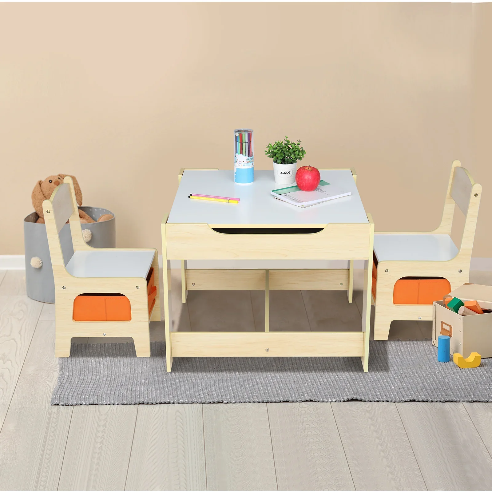 Una mesa y dos sillas con dos bolsas de almacenamiento Tablero de densidad color madera mesa y silla para niños 61,5*61,5*48 cm puede almacenar N201