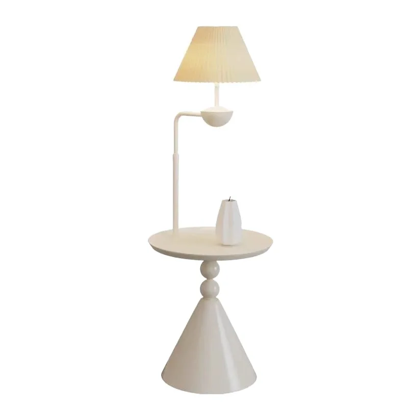 

Cream floor lamp, shelf ornament next to the living room sofa