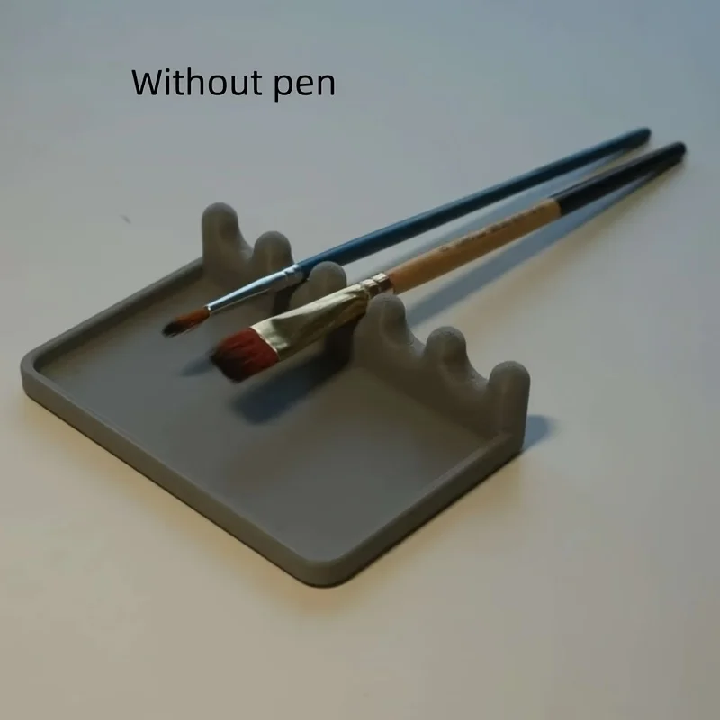 

Portable holder with drip tray for brushes, tray style design for holding brushes, and portable brush organizer