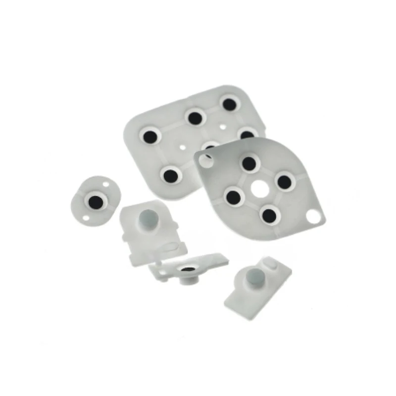 Yuxi แผ่นรองกุญแจ N64, แผ่นยางรองปุ่มนำไฟฟ้าแผ่นยางซิลิโคนสำหรับเปลี่ยนตัวควบคุม1ชุด