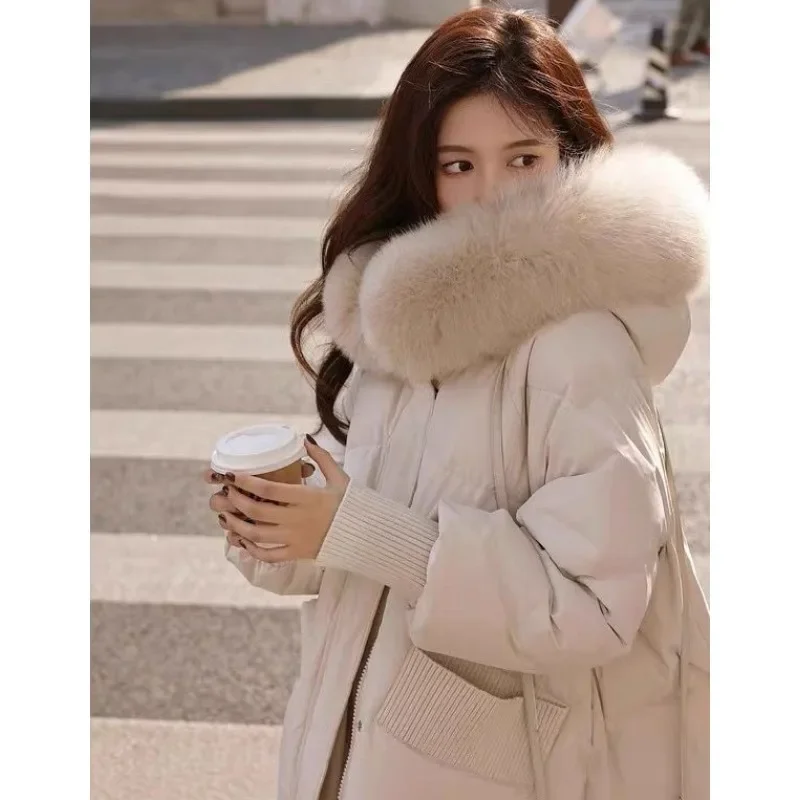 เวอร์ชั่นเกาหลีฤดูหนาวใหม่ขนขนาดใหญ่ลงเสื้อแจ็คเก็ตหญิงความยาวกลางสไตล์แฟชั่นหนาสําหรับความอบอุ่นเสื้ออินเทรนด์