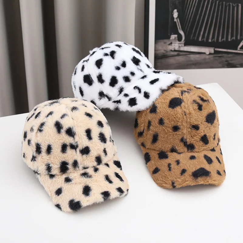 Lady's winter plush baseball cap with soft plush spots on the dome. Warm, adjustable, fashionable, casual, suitable for outdoor
