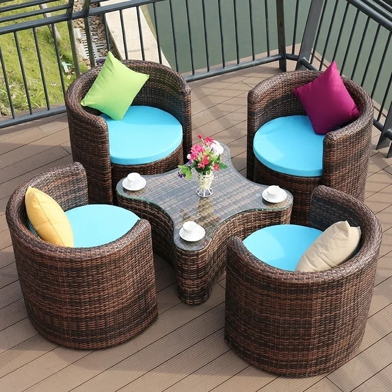 Outdoor leisure outdoor rattan chair tea table courtyard creative minimalist modern rattan woven table and chair furniture