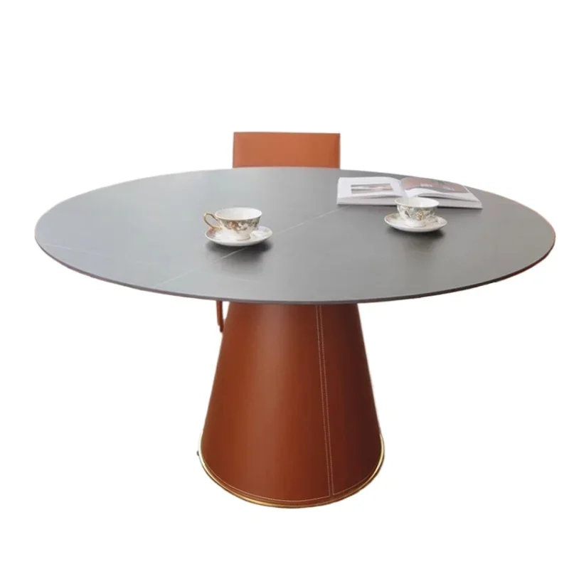 

European-style imported handmade leather fa mily multi-purpose round di ning tab le mes h rock slab dini ng