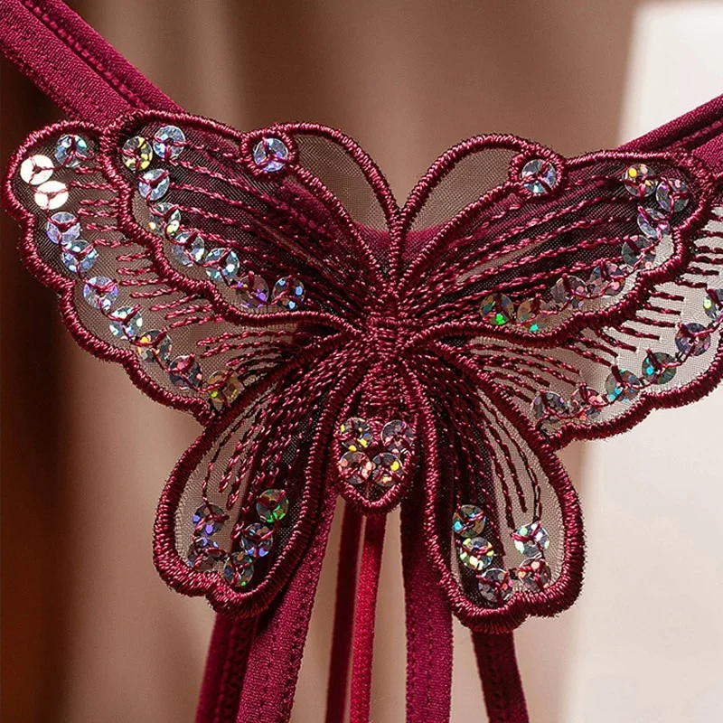 Sexy feminino frisado borboleta tanga arquivo aberto roupa interior com lantejoulas massagem em forma de t lingerie sexy