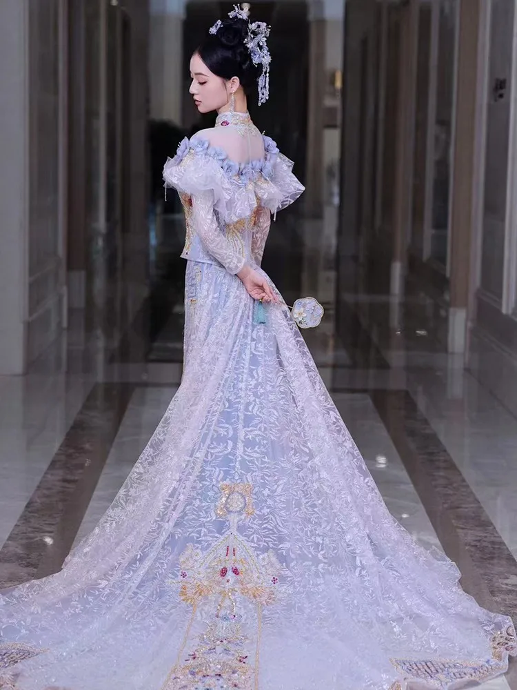 A Chinese-style with long tail and phoenix crown takes on the toasting attire of pavilion