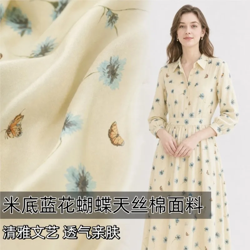 Semi-transparent and skin-friendly beige base blue cotton fabric for shirts dresses trousers cheongsam