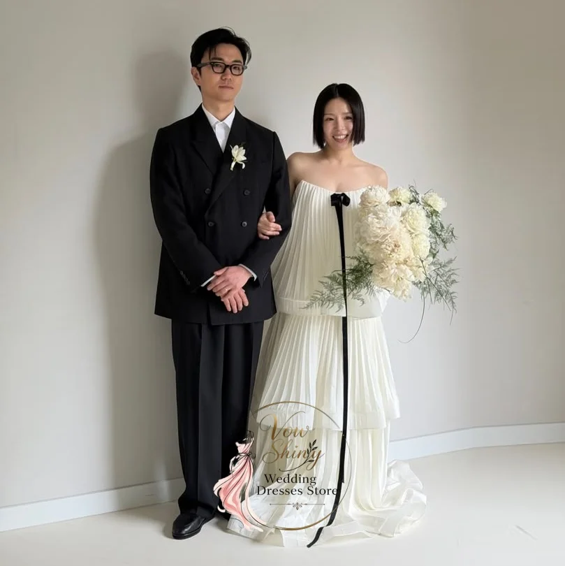 Vow Shiny Romantic Ivory Pleated Wedding Dress Strapless Tiered Chiffon A Line Floor Length Bridal Gown With Black Bow Detail