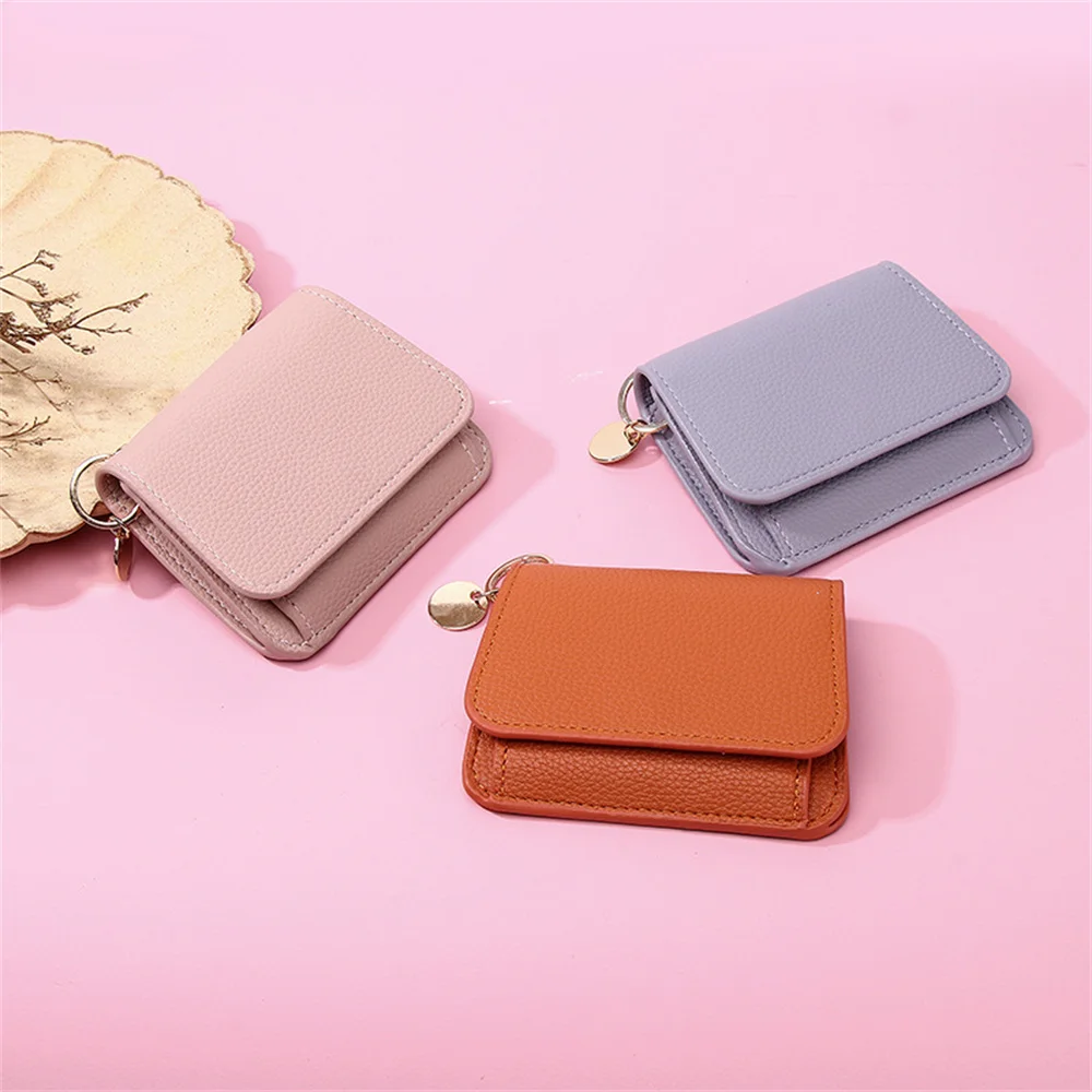 New Women's Short Wallet Fashionable and Trendy Splicing Advanced Contrast Color Short Leather Clip with Tassel Zipper Mult