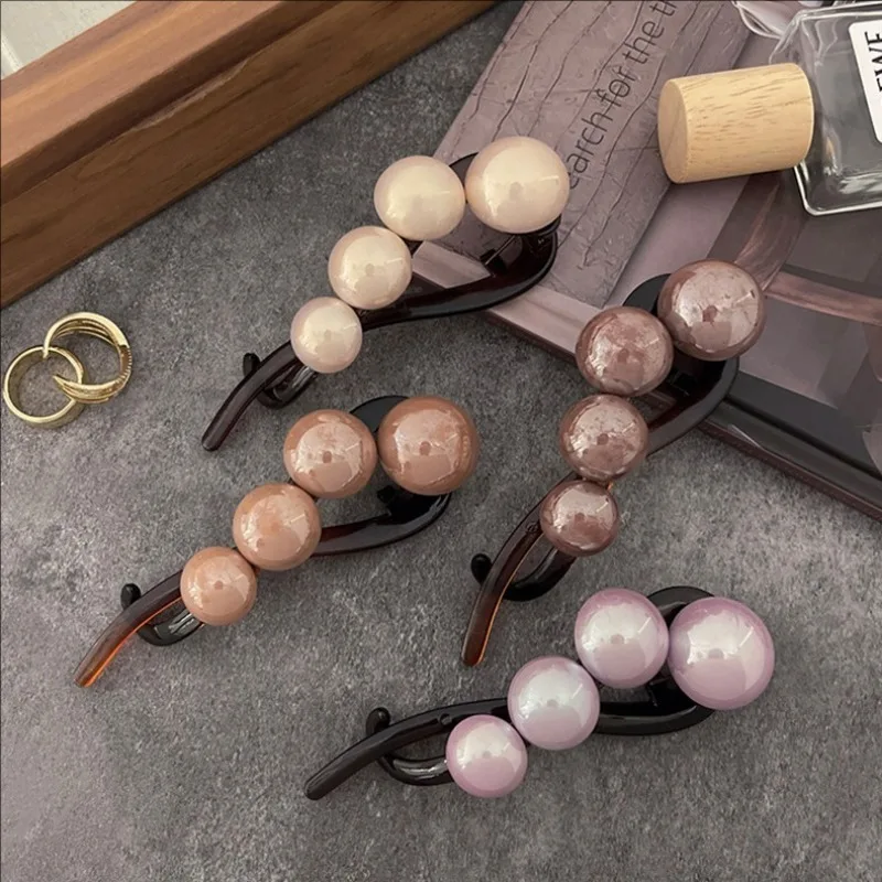 Fermaglio per capelli lisci con perle da 2 pezzi nuovi accessori per la testa delle donne di fascia alta grandi Clip a torsione con una parola temperamento a forcina copricapo elegante