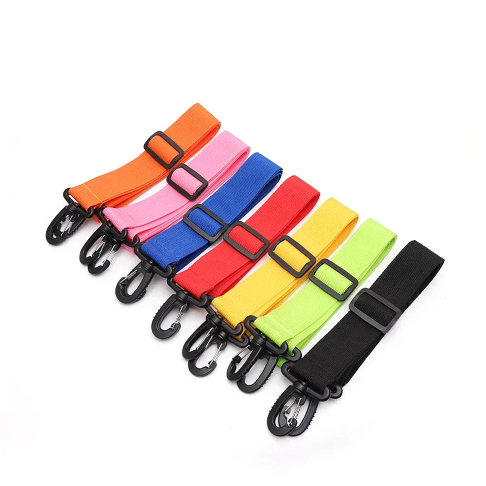 Multi-use transport strap made of nylon with rotating fasteners ideal for carrying paired ski boards or skateboards