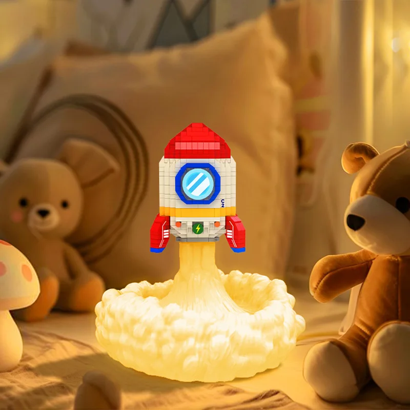 Set di blocchi di costruzione con razzo spaziale Modello di cartone animato aerospaziale con luce notturna assemblato giocattolo da costruzione per regalo di compleanno per ragazzo