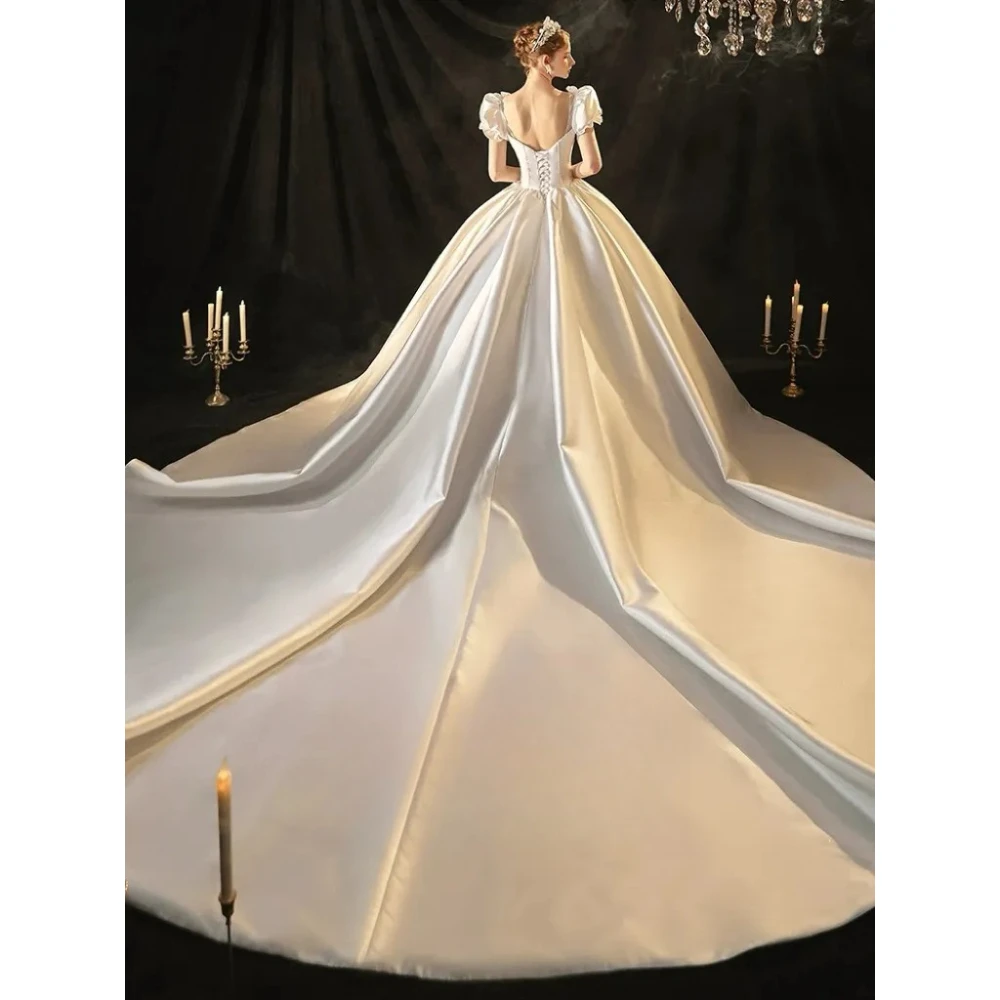 Customized Luxury Bubble Sleeve Satin Wedding Dresses 2026 White V-neck Tight Corset with Ruffled Edges and Fluffy Bridal Gown