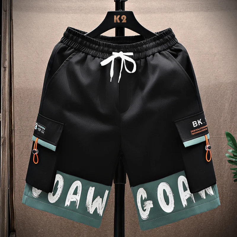 ملابس العمل غير الرسمية orts الرجال الصيف فضفاض مستقيم الساق خمسة أرباع طول العلامة التجارية العصرية في سن المراهقة بناطيل الشواطئ ألياف البوليستر