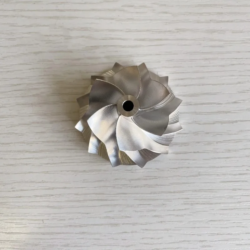 

GT15-25 6 + 6 лезвий 41,52/56,02 мм 701374-0001/701374-0006 Высокопроизводительное точечное фрезерное колесо компрессора с кривой заготовки