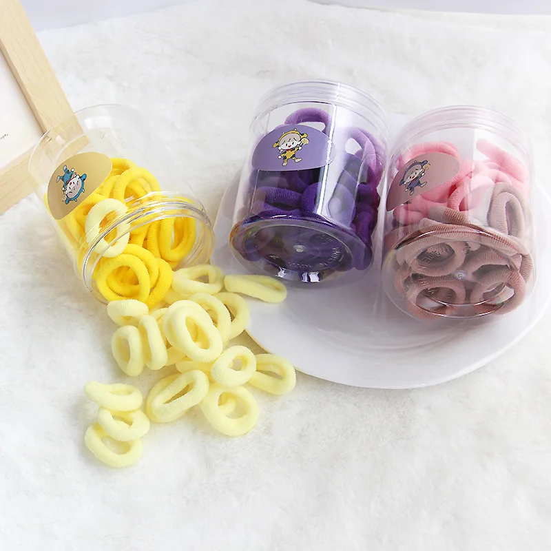 أربطة شعر للأطفال 50 قطعة جرة بلاستيكية ربطات عنق تيري عالية المرونة تصميم سلس خالي من التشابك مجموعة حوامل ذيل حصان صغيرة