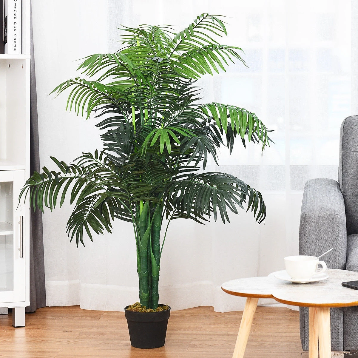 Un palmier artificiel de 3,5 pieds de long avec des plantes artificielles réalistes et réglables pour la décoration de la maison, du bureau et du hall d'hôtel.