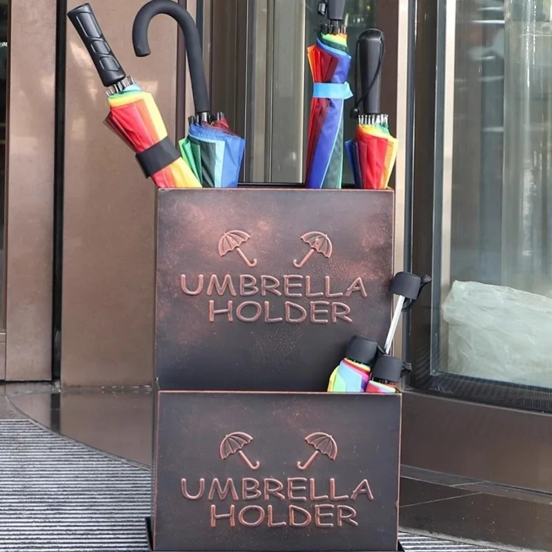 

American umbrella rack, coffee shop, tea shop, umbrella storage rack, entering the door umbrella bucket, hotel lobby