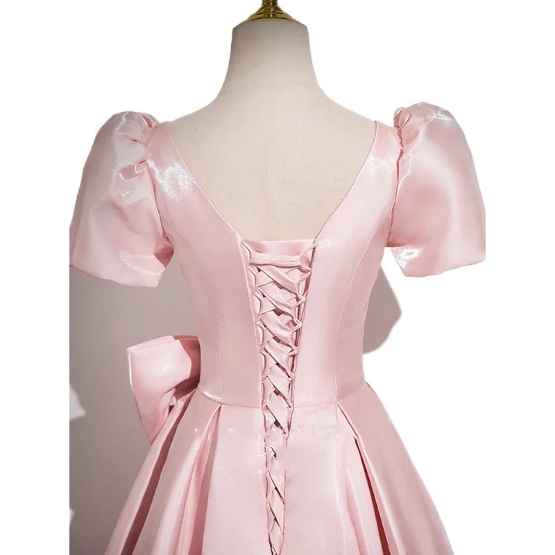 2025 New Women's Pink Satin Dress Fashionable, Slim and Elegant Annual Meeting Bow Decoration Long Back Strap Dress