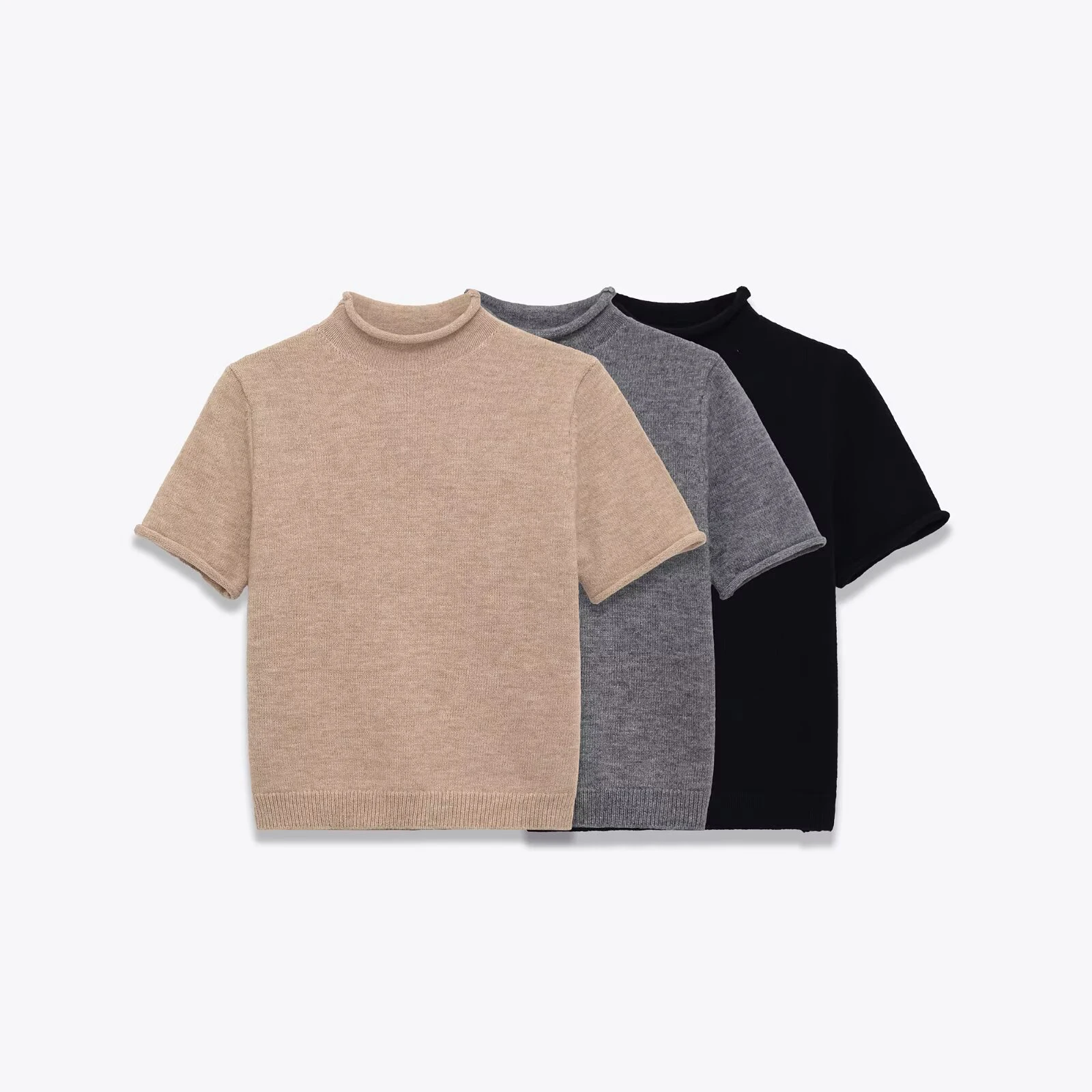 

European and American style winter new product women's clothing design sense semi high neck short sleeved soft knit sweater