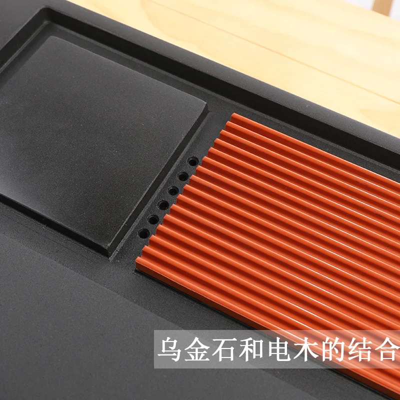

Natural Wujinshi tea tray tea set automatic water table kettle integrated induction cooker household sea