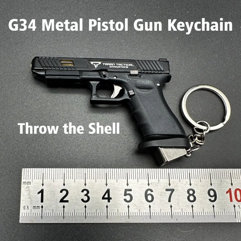 

1:3 Pistol Metal Keychain Set with Ammunition Drop Feature Alloy Material Gun Toy Handheld Grab Model for Home Decor Collectible
