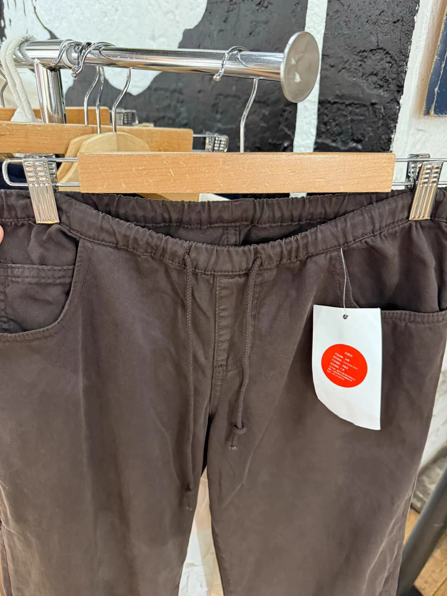 กางเกงขายาวทรงตรงแบบมีเชือกผูกเอวต่ำ มีกระเป๋า สีพื้น เรียบง่าย สไตล์วินเทจ สตรีทแวร์ แมทช์ได้กับทุกชุด ทรงหลวม