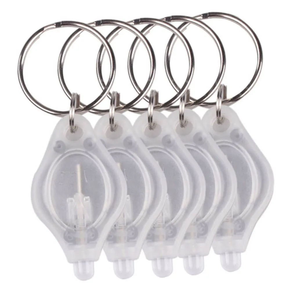 10pcs Mini Keychain Light LED Micro Light Keychain Outdoor Emergency Flashlight ABS Squeeze Light Key Ring For Camping Hiking