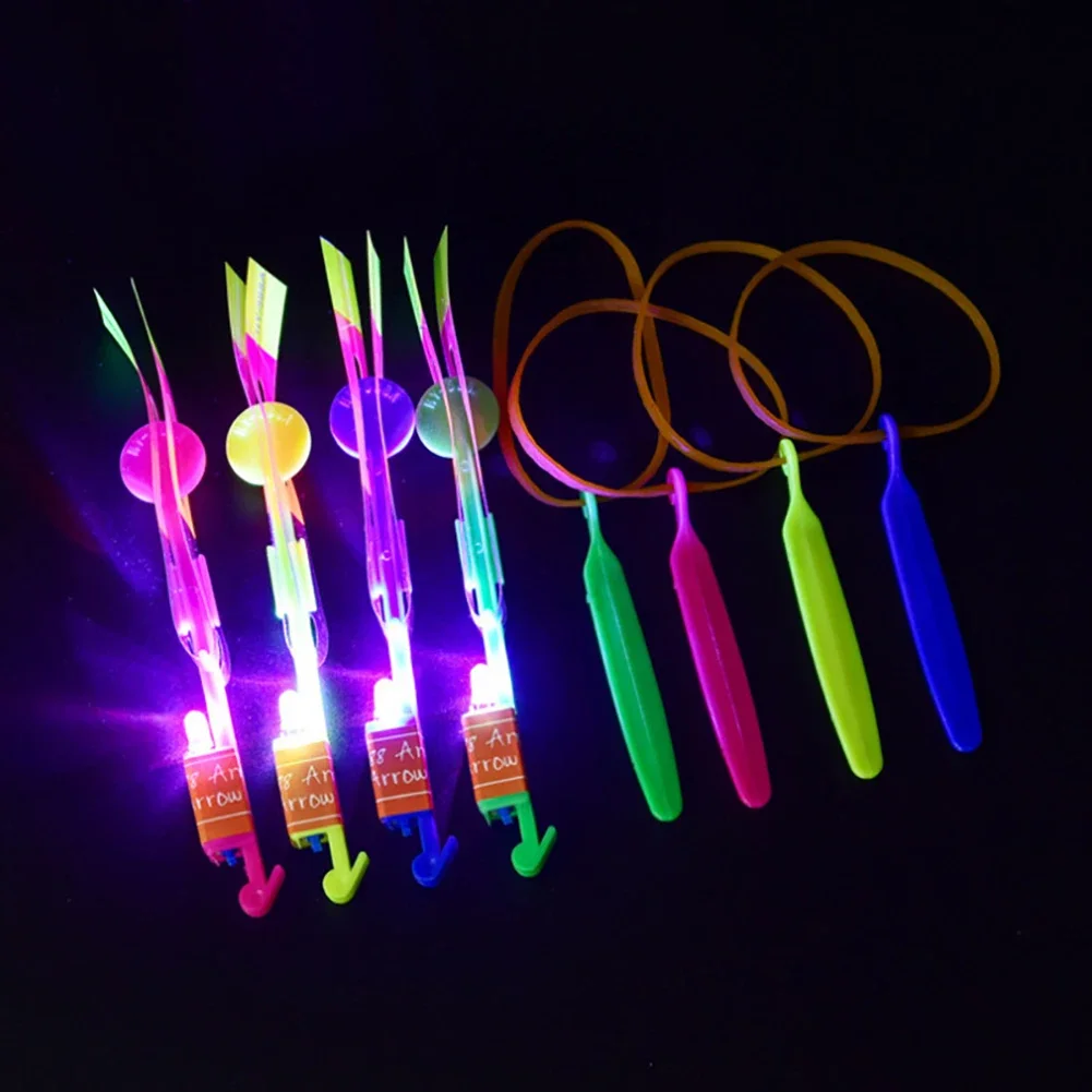 

1pc LED Slingshot Elastic Helicopter Rotating Flying Toy Arrow Outdoor Shining Rocket Flash Gift Children Fairy Catapult