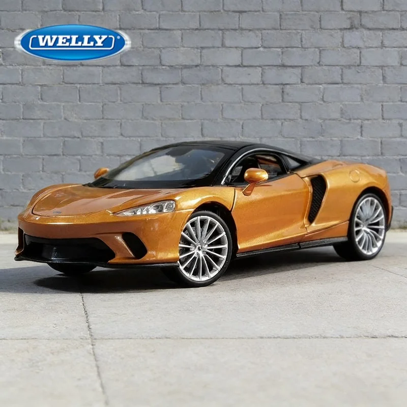 

Модель спортивного автомобиля WELLY 1:24 McLaren GT, литая под давлением, металлическая, для гонок на треке, высокая детализация, коллекционная, подарок для детей