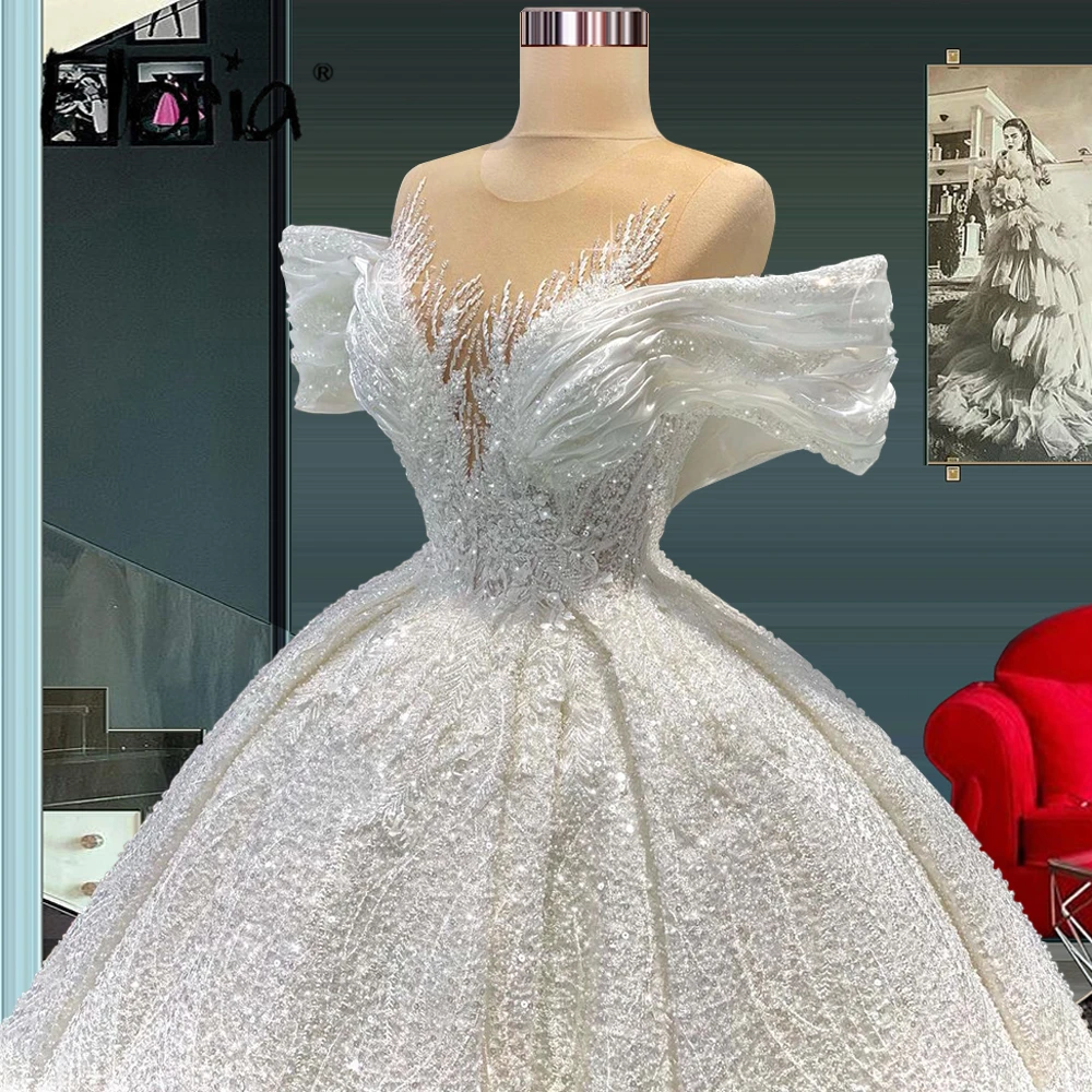 

Floria Nude Neck Off Shoulder Beaded Wedding Gowns with Royall Train 2022 Gorgeous Quinceanera Ball Gown Bridal Dress Plus Size