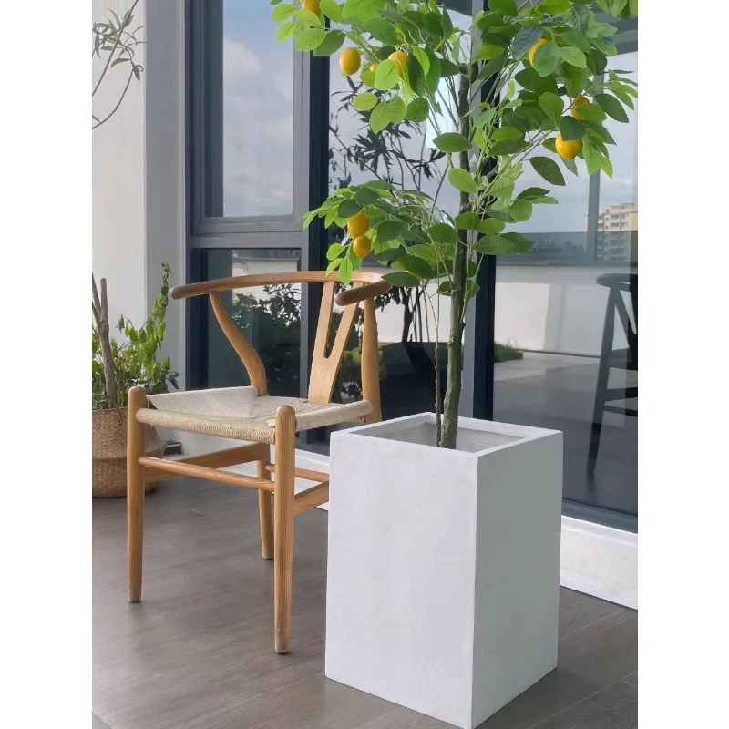 Nordic minimalist magnesium mud square high floor-to-ceiling flowerpot piano, leaf fir, bird of paradise, wabi sandy wind floor-