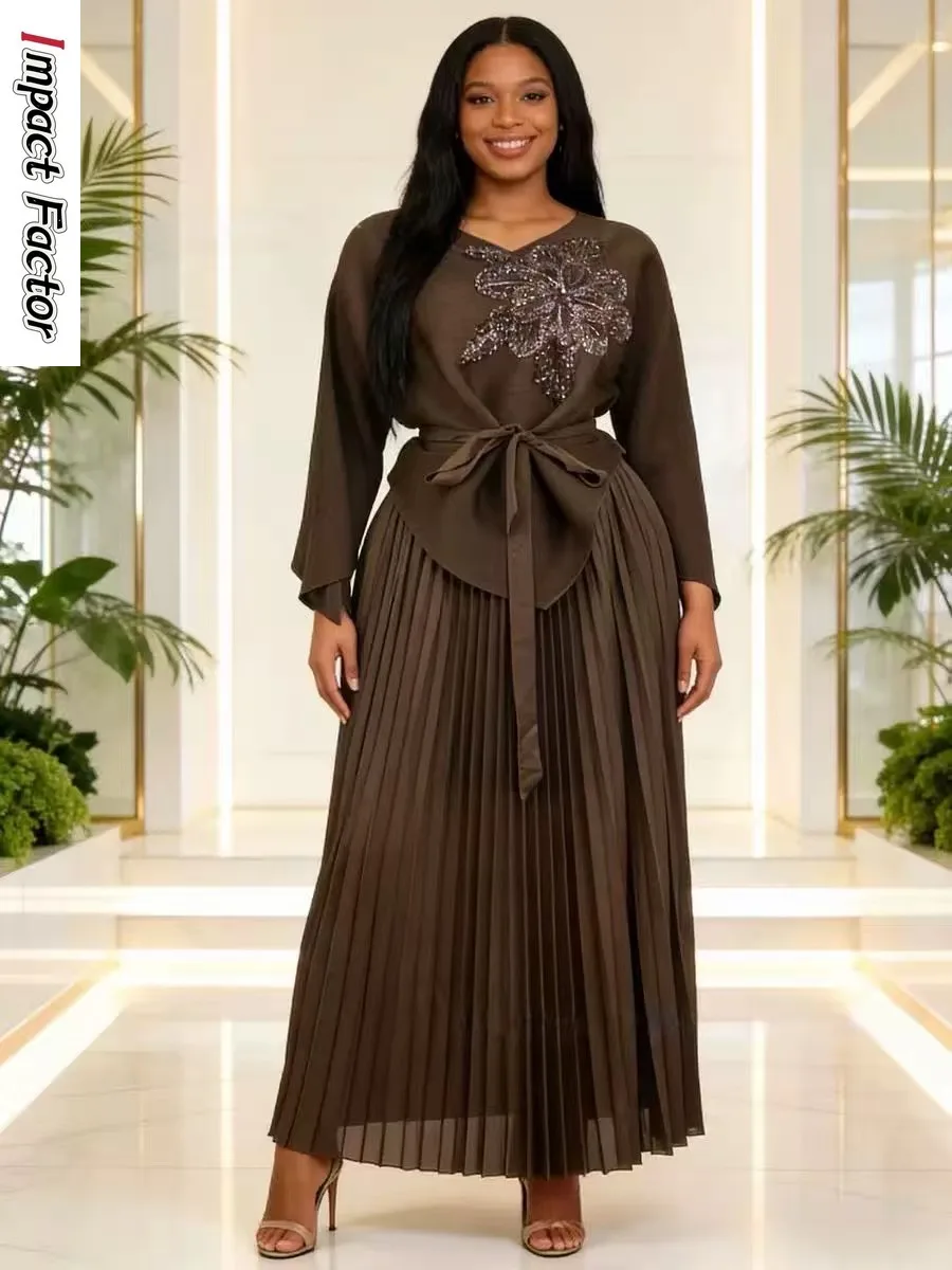 

2026 New Miyake Pleated Suit Two-piece Set Loose Irregular Top Skirt Belt Long Sleeve Temperament Socialite Woman