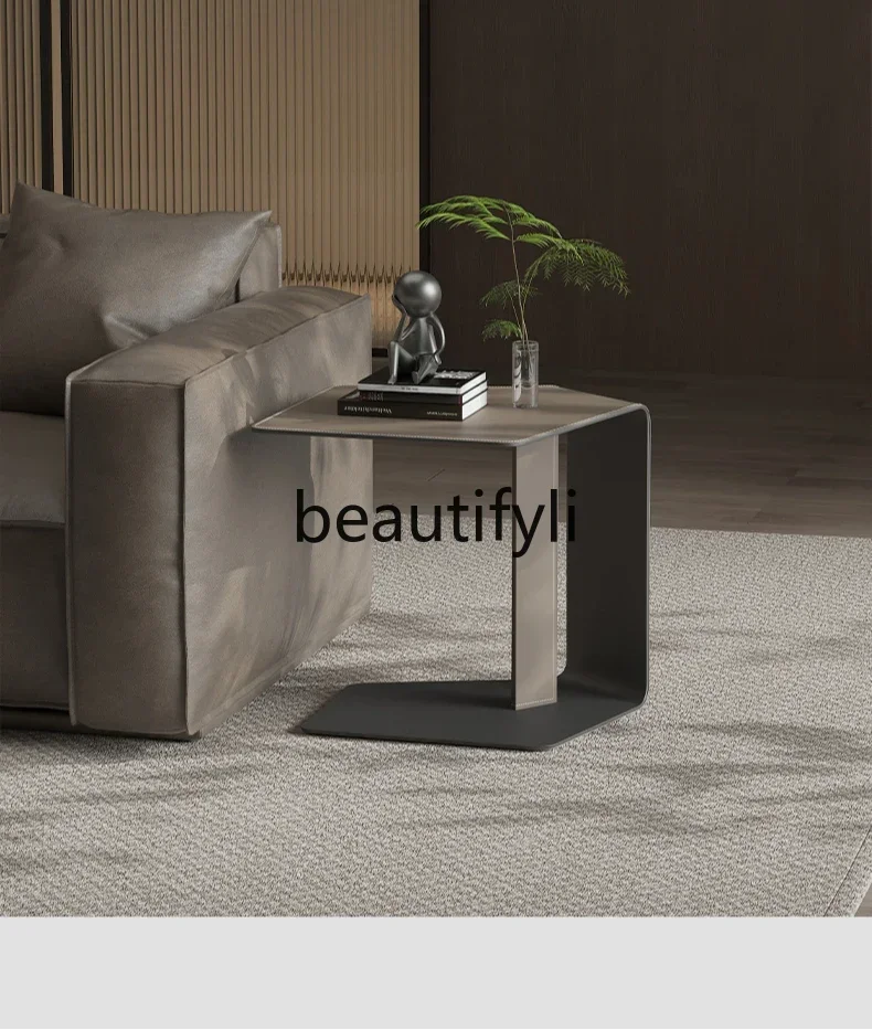 

Italian minimalist sofa side a few saddles leather corners a few light luxury high-end creative small coffee table table