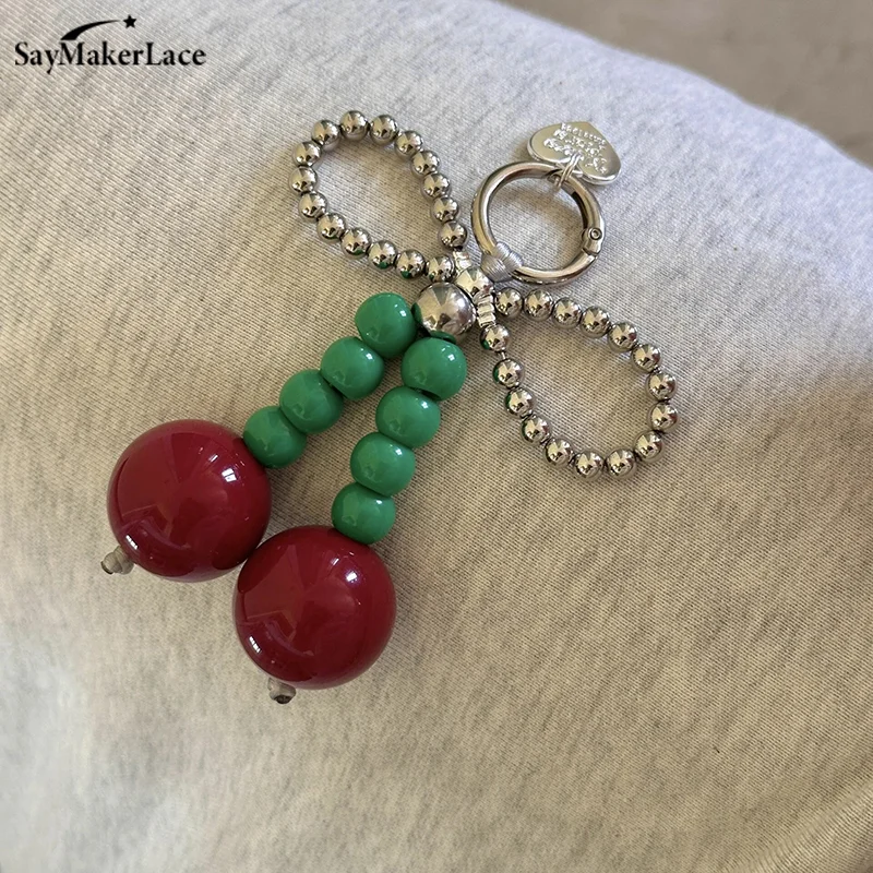 رائعة القوس الكرز سلاسل المفاتيح على ظهره قلادة الإبداعية جراب هاتف مفتاح سلسلة زوجين على ظهره قلادة الهدايا