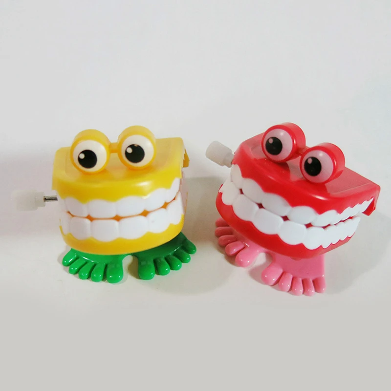 1pcs Clockwork Toy Upper Chain Jumping Tooth Toy Children Jump Teeth Running Clockwork Spring Wind Up Toy